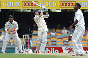 Australia's Michael Clarke belts a six from a Muralitharen ball, Australia v Sri Lanka first test - AAP Image/Tony Phillips
