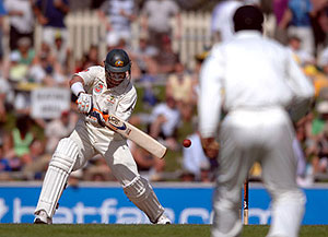 Australian batsman Michael Hussey plays a cut shot on his way to scoring 101 not out. AAP Image/Julian Smith