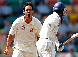 Australian cricketer Mitchell Johnson celebrates dismissing Prasanna Jayawardane. AAP Image/Julian Smith