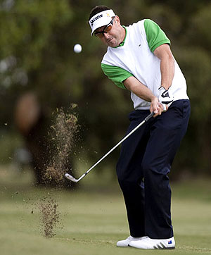 Australia's Robert Allenby hits an approach shot at the Australian Masters - AAP Image/Andrew Brownbill