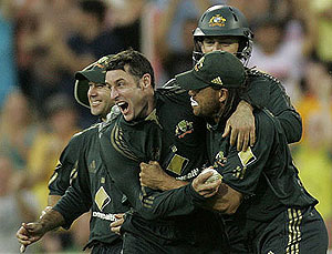 Australias Mike Hussey celebrates with Andrew Symonds and Ricky Ponting. AP Photo/Rob Griffith