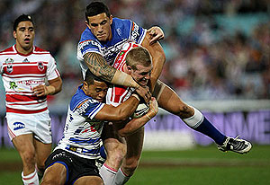 Ben Creagh monstered by Sonny Bill Williams and Ben Roberts. AAP Image/Action Photographics/Colin Whelan