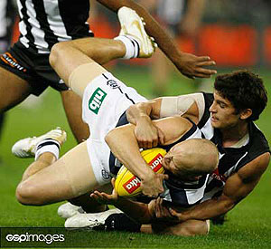 Sharrod Wellingham from Collingwood tackles Gary Ablett from Geelong during the AFL Indigenous Round 09 match between the Collingwood Magpies and the Geelong Cats at the MCG. GSP Images/Greg Ford