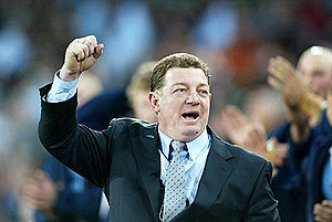Sydney, July 7, 2004. NSW Blues Coach Phil Gould celebrates. The NSW Blues beat the Queensland Maroons 36-14 in the third State of Origin match to win the series at Telstra Stadium. AAP Image/Action Photographics/Colin Whelan