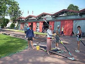 The crew preparing the oars and boat for training in Varese.  (L-R: Stephen Stewart, Dave Dennis, Me, Sam Loch. Remaining crew member in background)