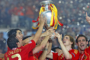 Spain\'s Fernando Torres, 2nd right, holds the trophy after the Euro 2008 final between Germany and Spain - AP Photo/Bernat Armangue