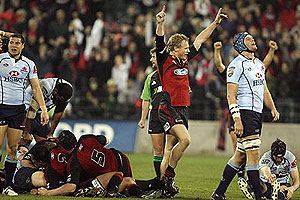 Crusaders players start to celebrate their win against the Waratahs as the full time whistle sounds following the Super 14 Rugby Final match between the Crusaders and the NSW Waratahs, AMI Stadium, Christchurch, New Zealand, Saturday, May 31, 2008. The Crusaders beat the Waratahs 20-12. AAP Image/NZPA, Wayne Drought