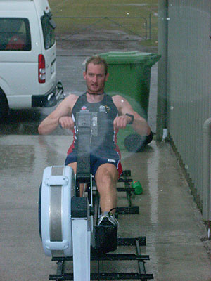 Dave Dennis ergo in the rain. The gym we\'re using is a small shed next to a footy field. the gym is so small dave got bunted to the outdoor spot. The heavens opened, but he kept training. Inspirational stuff.