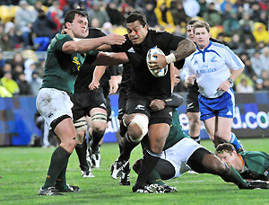 New Zealand All Blacks\' Sione Lauaki, right, fends off South Africa\'s Bismarck du Plessis during their international rugby test at Westpac Stadium, in Wellington, New Zealand, Saturday, July 5, 2008. AP Photo/NZPA, Ross Setford