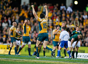 Australia's Adam Ashley-Cooper celebrates Australia's win during the Tri Nations Test match between the Australian Wallabies and the South African Springboks played at the Subiaco Oval in Perth. AAP Image/Tony McDonough