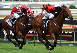 Weekend Hussler riden by Brad Rawiller (left) gallops to victory in the Oakleigh Plate at Caulfield Racecourse in Melbourne