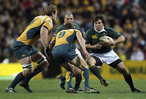 South Africa\'s Schalk Brits, right, under siege from Rocky Elsom, left, and Luke Burgess during Rugby Test against Australia at Subiaco Oval in Perth, Australia, Saturday July 19, 2008. AP Photo