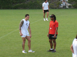 Former Australian rugby league player Sonny Bill Williams listens to team coach Tana Umaga at the team training ground of his new team, Toulon rugby union club in France, Thursday, August 7, 2008. Legal action by his former team, the Canterbury Bulldogs, is pending. AAP Image/Belinda Tasker