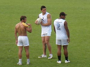 Former Australian rugby league player Sonny Bill Williams stands with team mates as he listens to instructions at the team training ground of his new team, Toulon rugby union club in France, Thursday, August 7, 2008. Legal action by his former team, the Canterbury Bulldogs, is pending. AAP Image/Belinda Tasker