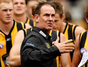 Richmond Coach Terry Wallace addresses his players during the AFL Round 14 match between the Richmond Tigers and the Carlton Blues at the MCG. GSP Images