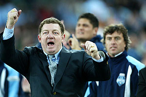 Sydney, July 7, 2004. NSW Blues Coach Phil Gould celebrates a try. The NSW Blues beat the Queensland Maroons 36-14 in the third State of Origin match to win the series at Telstra Stadium, Sydney tonight. AAP Image/Action Photographics/Colin Whelan