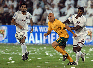 The Socceroos agaist Qatar in their World Cup qualifier against Qatar in Doha in June. AAP Images