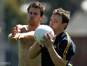Campbell Brown (L) & Nathan Foley (R) in action during an Australian International Rules Training Session at Arden Street, Melbourne. Slattery Media Group