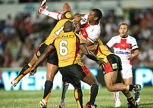  Leon Pryce is lifted in the tackle during the International Rugby League World Cup match, England v Papua New Guinea in Townsville, Saturday, Oct. 25, 2008. England beat Papua New Guinea 32-22. AAP Image/Action Photographics, Colin Whelan