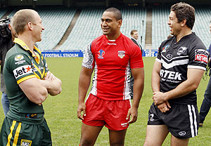  Rival Rugby League World Cup team captains Australia's Darren Lockyer, left, Tonga's Lopini Paea and New Zealand's Nathan Cayless, right, chat during a media event in Sydney, Monday, Oct. 20, 2008. Rugby League World Cup begins on Saturday Oct 25. AP Photo/Mark Baker