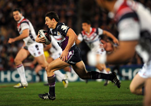 Billy Slater breaks away during the NRL Round 23 Match, Melbourne Storm v Sydney Roosters at Olympic Park, Friday, Aug. 15, 2008. Melbourne Storm beat the Roosters 30-6. AAP Image/Action Photographics, Jeff Crow