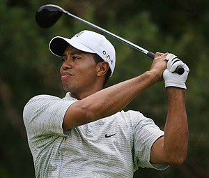 Tiger Woods watches his drive off the 5th tee