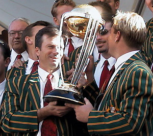 Australian cricket captain Steve Waugh (left), and Vice Captain Shane Warne (right) display the World Cup Cricket trophy. Australia's 1 Day Cricket World Cup winning team drove in a motorcade down Sydney's main street to celebrate in a ticket tape parade with over 100,000 well wishers attending. AAP Photo/ Pablo Ramire