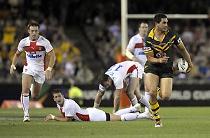  Australian Greg Inglis leaves a English defenders in his wake as he runs n a try during the Australia versus England Rugby League World Cup pool match at Docklands Stadium in Melbourne, Sunday, Nov 2, 2008. Australia won 52- 4. AAP Image/Julian Smith