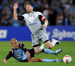 Melbourne Victory's Kevin Muscat, right, is tackled by Sydney FC's Ruben Zadkovich during their round 7 A-League match in Sydney on Saturday, Oct. 6, 2007. AAP Image/Paul Miller