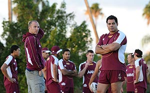 Queensland State of Origin coach Mal Meninga (right) and an injured Darren Lockyer (left) during the Queensland team training session. AAP Image/Dave Hunt