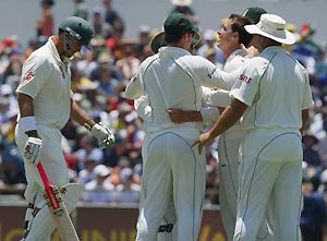 South African Dale Steyn (centre right) celebrates the wicket of Matthew Hayden (left) caught and bowled for four during the third day of their Test match against Australia at the WACA ground in Perth, Friday, Dec. 19, 2008. AAP Image/Tony McDonough