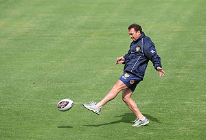 The Australian rugby league team coach Ricky Stuart kicks the ball during his team's training session at OKI Jubilee Stadium in preparation for the Rugby League World Cup, Sydney, Wednesday, Oct. 22, 2008. Australia takes on New Zealand in the RLWC in Sydney this Sunday. AAP Image/Dean Lewins