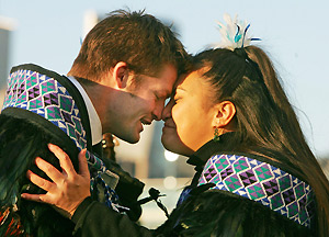New Zealand All Blacks rugby captain Richie McCaw, left, exchanges a Hongi, a traditional Maori greeting in New Zealand, with a performer ahead of the draw for the Rugby World Cup 2011 pool allocation outside a giant rugby ball beside Tower Bridge in London, Monday Dec. 1, 2008. Defending champion South Africa must play Wales at the next rugby union World Cup in 2011 and host New Zealand will meet France in a repeat of their dramatic quarterfinal a year ago. AP Photo/Geoff Caddick, PA
