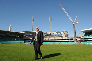 Sydney Crickert Ground (SCG) Trust chairman Rodney Cavalier stands in front of the newly named Victor Trumper Stand, Sydney, Thursday, June 12, 2008. The new $70 million "Hill" stand, with 8,700 undercover seats, at the SCG will be named after batsman Victor Trumper, with strong links to three football codes also played at the ground. AAP Image/Dean Lewins