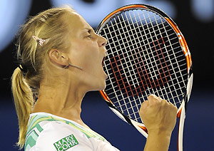 Australia's Jelena Dokic reacts after winning a point against Russia's Alisa Kleybanova during their women's singles match at the Australia Open Tennis Championships in Melbourne, Australia, Sunday, Jan. 25, 2009. AP Photo/Andrew Brownbill