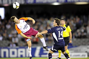 Matt McKay (left) and Billy Celeski in action during Round 18 of the Hyundai A-League between Melbourne Victory FC and Queensland Roar FC at Telstra Dome, Melbourne, Friday, Jan. 2, 2009. AAP Image/Raoul Wegat