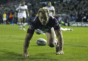 Manly Sea Eagles' Brett Stewart scores a try during their World Club Challenge rugby league match against Leeds Rhinos at Elland Road Stadium, Leeds, England, Sunday, March 1, 2009. AP Photo/Paul Thomas