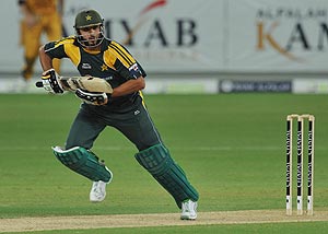 Pakistan's Shahid Afridi makes a run against Australia during the one day international cricket match between Pakistan and Australia in Dubai, United Arab Emirates, Wednesday, April 22, 2009. (AP Photo/Andrew Parsons)