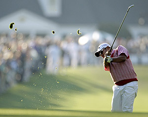 Prayad Marksaeng of Thailand hits his second shot on the first hole during the first round of the Masters golf tournament at the Augusta National Golf Club in Augusta, Ga., Thursday, April 9, 2009. AP Photo/Morry Gash