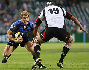 David Pocock of the Western Force faces his opponent, Gerhard Mostert of the Lions in their Super 14s match at Subiaco Oval, Perth, Australia, Friday April 24, 2009. (AP Photo)