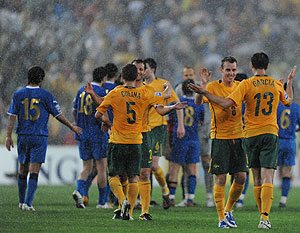 Australia celebrate their win over Uzbekistan in their World Cup Asian Qualifying match in Sydney, Wednesday, April 1, 2009. Australia defeated Uzbekistan 2-0. (AAP Image/Dean Lewins)