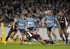 Johnathon Thurston of Queensland scores a try during the Queensland v New South Wales State of Origin Rugby League game at the Ethiad Stadium in Melbourne, Wednesday, June 3rd, 2009. AAP Image/Martin Philbey