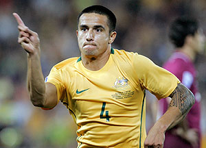 Australia's Tim Cahill celebrates after scoring the first goal for Australia during the World Cup qualifying soccer match between Australia and Qatar at the Brisbane stadium in Brisbane, Australia, Wednesday, Oct. 15, 2008. AP Photo/Tertius Pickard
