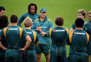 Australian rugby union coach Robbie Deans (centre) talks to players during a training session for the team in Sydney on Monday, June 1, 2009. The Wallabies will play the Barbarians on Saturday night. AAP Image/Paul Miller