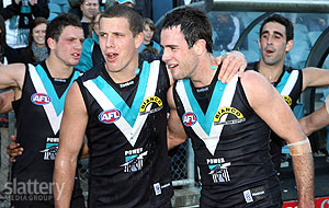 Nick Salter and Matthew Broadbent of Port celebrate victory after the AFL Round 16 match between Port Adelaide Power and the West Coast Eagles at AAMI Stadium. The Slattery Media Group