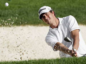 Adam Scott, from Australia, hits for the sand to the 10th green during the first round of the Bridgestone Invitational golf tournament Thursday, Aug. 6, 2009, at Firestone Country Club in Akron, Ohio. AP Photo/Mark Duncan