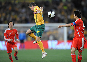 Australia's Harry Kewell heads the ball during their World Cup qualifier match Against China at ANZ Stadium, Sydney, Sunday, June 22, 2008. AAP Image/Dean Lewins