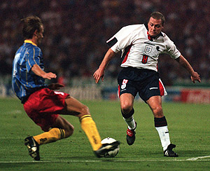 England's Paul Gascoigne, right, in action against Moldova during the World Cup qualifing match at Wembley Stadium in London Wednesday, Sept. 10, 1997. England defeated Moldova 4-0. England now only need one point in the qualifying climas in Rome on Oct. 11 to win the ghroup and condemn Italy to the second-placed lottery. AP Photo/Dave Thomson