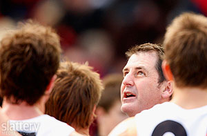 St Kilda coach Ross Lyon addresses his players at quarter time during the AFL Round 22 match between the Melbourne Demons and the St Kilda Saints at the MCG. Slattery Images