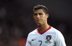 Portugal's Christiano Ronaldo reacts after the drawn World Cup group 1 qualifying soccer match against Denmark at Parken in Copenhagen, Denmark, Saturday Sept. 5, 2009. Portugal badly needed a victory in Copenhagen to have a realistic chance of qualifying for next year's World Cup in South Africa. The Portuguese team has won just two of its six qualifying matches and drew another.(AP Photo/Tariq Mikkel Khan/POLFOTO) 